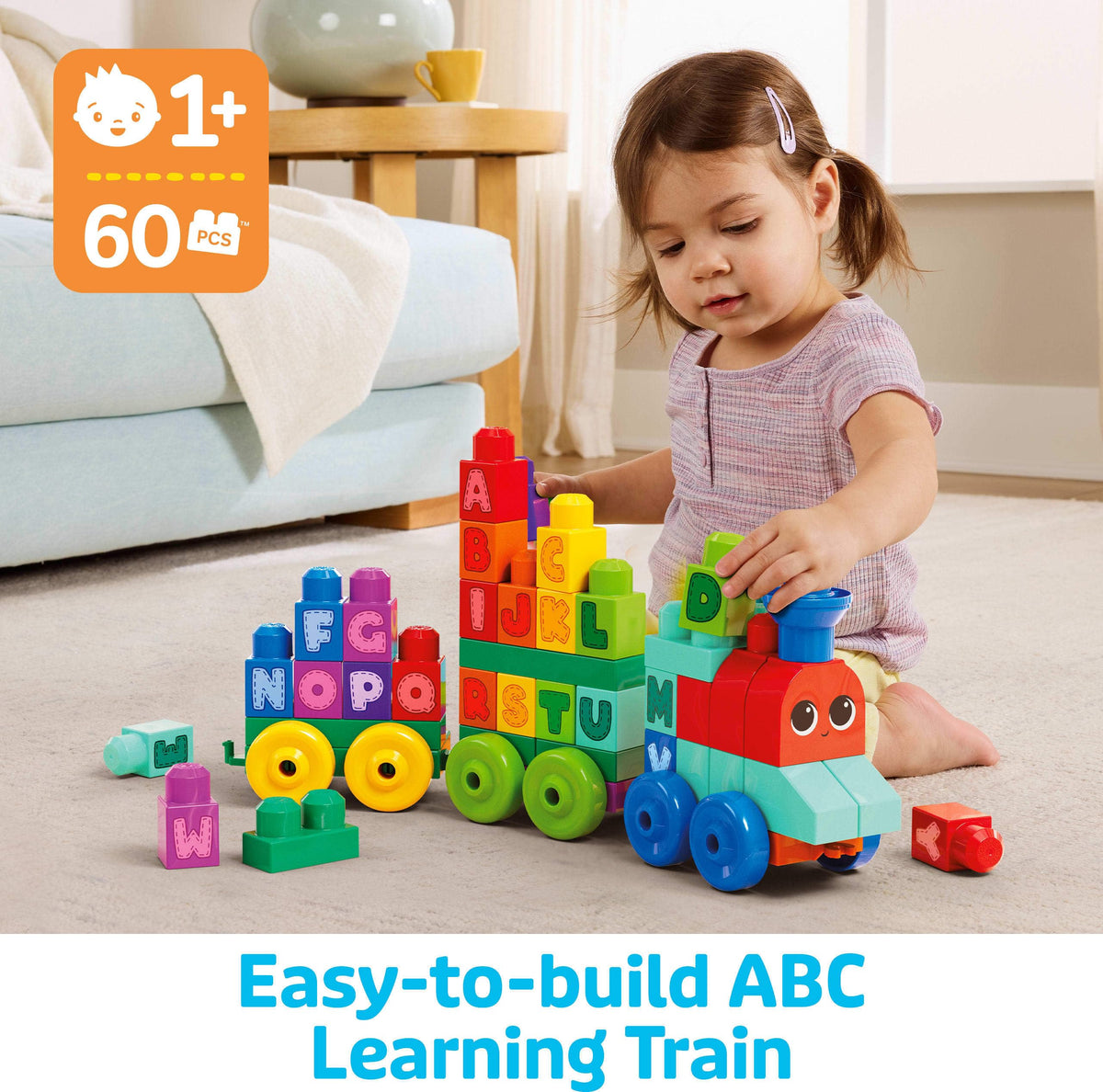 Mega Bloks ABC Train assembly scene highlights fine motor skills.