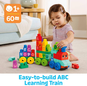Mega Bloks ABC Train assembly scene highlights fine motor skills.