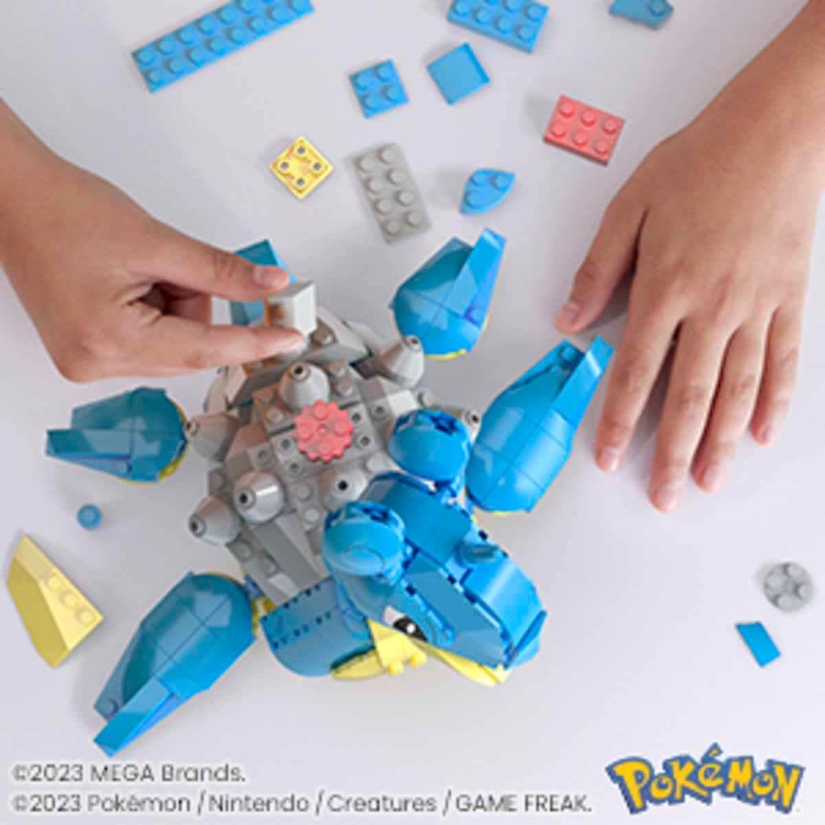 Mega Bloks Pokémon Lapras head movement during crank action enables dynamic aquatic play