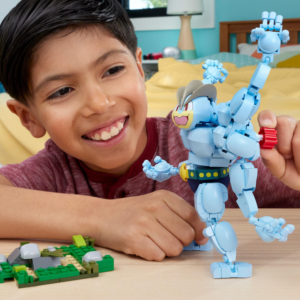 Mega Brands Machamp assembly detail highlights articulated arms.