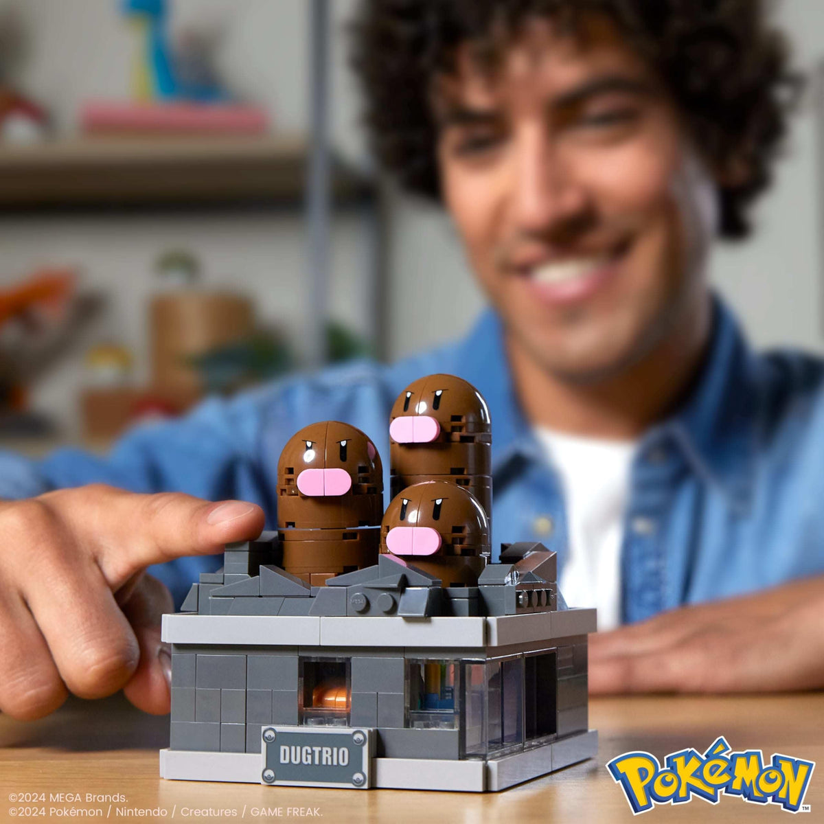 Mega Brands mini motion Dugtrio being assembled shows tactile building fun for collectors.