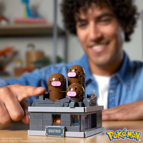 Mega Brands mini motion Dugtrio being assembled shows tactile building fun for collectors.
