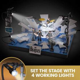 Four poseable MEGA Beatles figures with authentic instrument swaps.