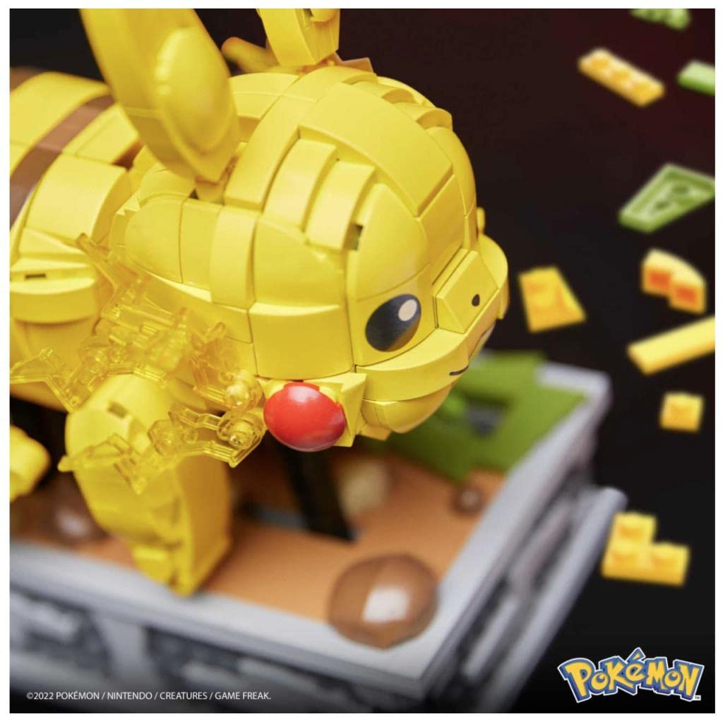 Pikachu in buildable display case with animated rocky path.