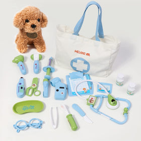 Meland Toy Doctor Kit scissors and tweezers for fine motor practice.
