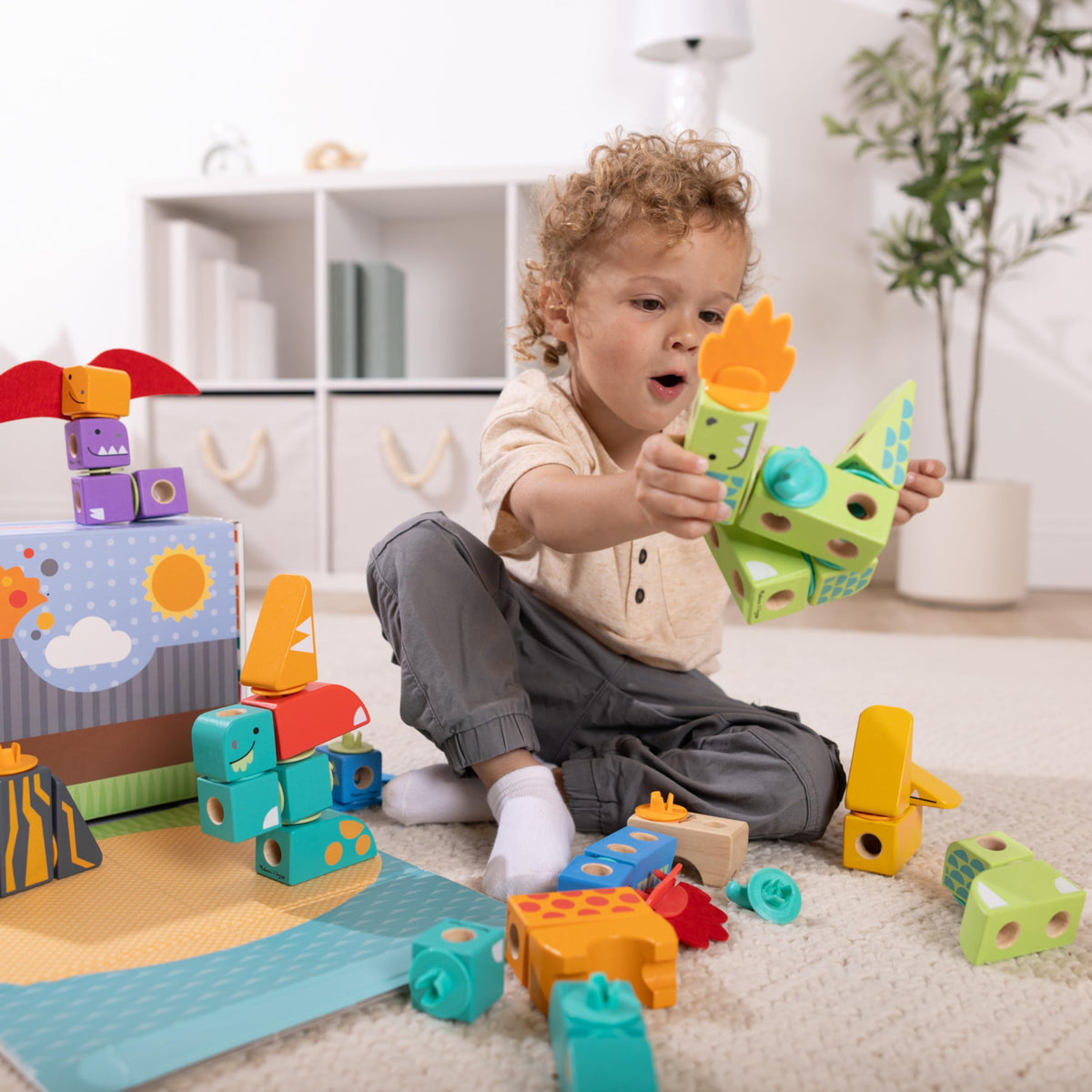 Melissa and Doug Blockables T-rex being assembled with easy connectors.