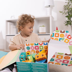 Melissa and Doug Blockables Triceratops and Stegosaurus figures inspire storytelling play.