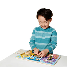 Melissa & Doug board reveals animal illustrations behind numbered doors.