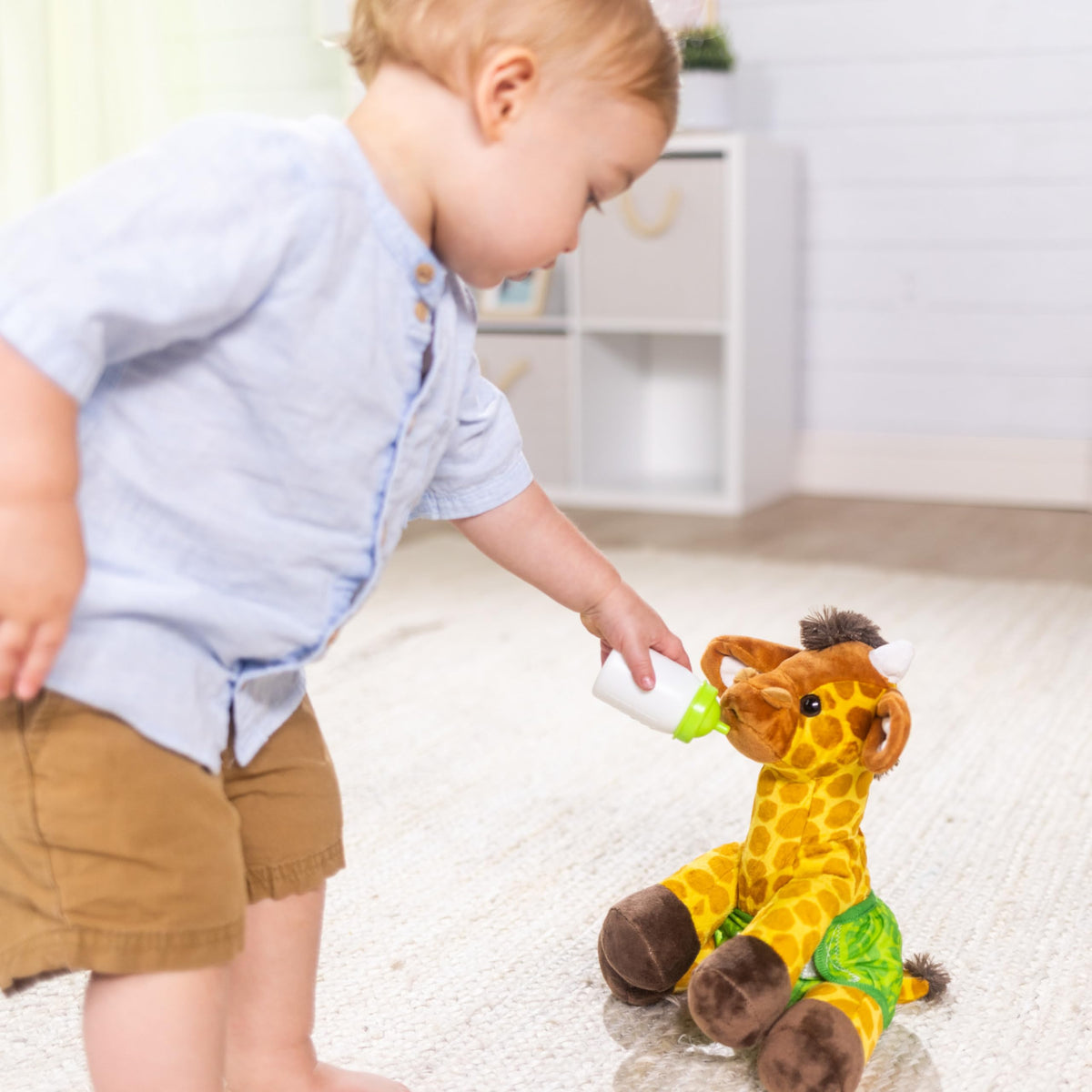 Melissa and Doug baby giraffe facts card sharing wild habitat details.