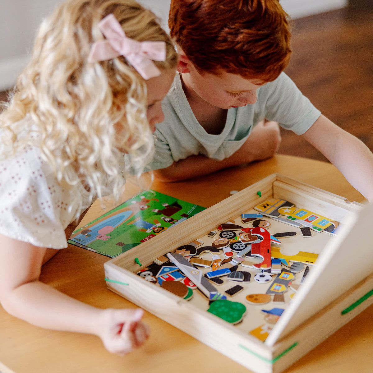 Melissa and Doug backyard scene magnets on board for creative storytelling.