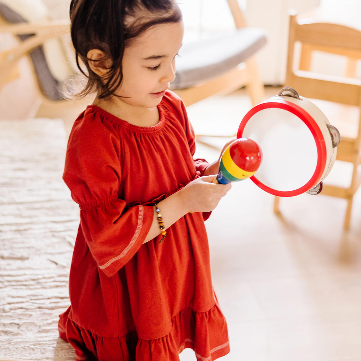 Melissa & Doug Band-in-a-Box tone blocks create varied pitches for listening skills.