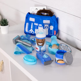 Melissa & Doug Barber Shop zippered bag keeps everything organized after playtime.