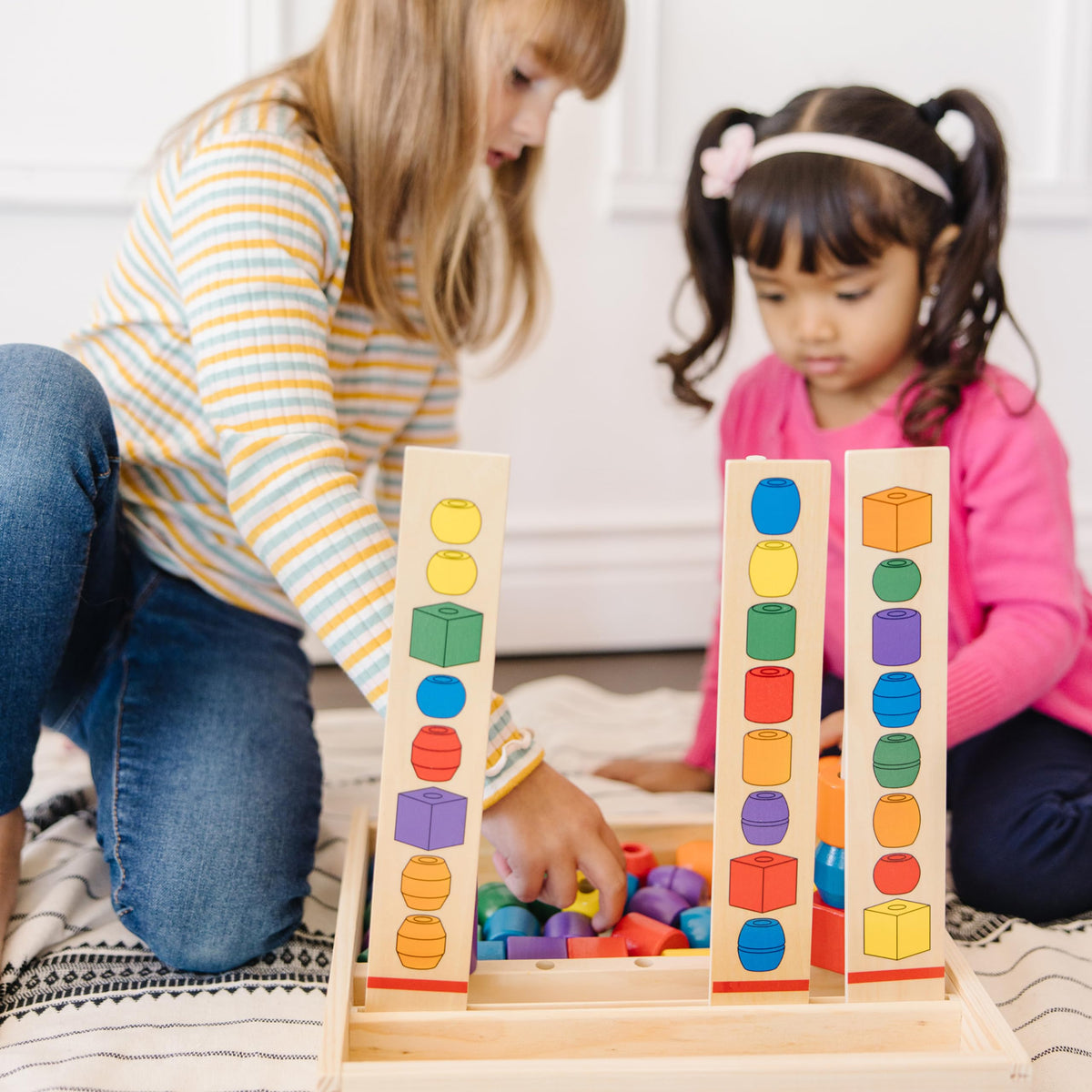 Melissa and Doug Bead Sequencing Set double-sided pattern boards present varied challenges