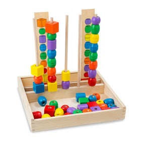 Melissa and Doug Bead Sequencing Set storage box keeps pieces organized after play