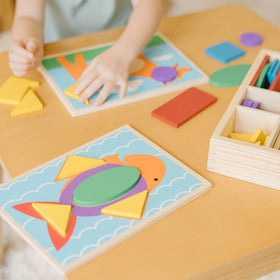 Melissa & Doug Beginner Pattern Blocks child using blocks at table for hands-on learning