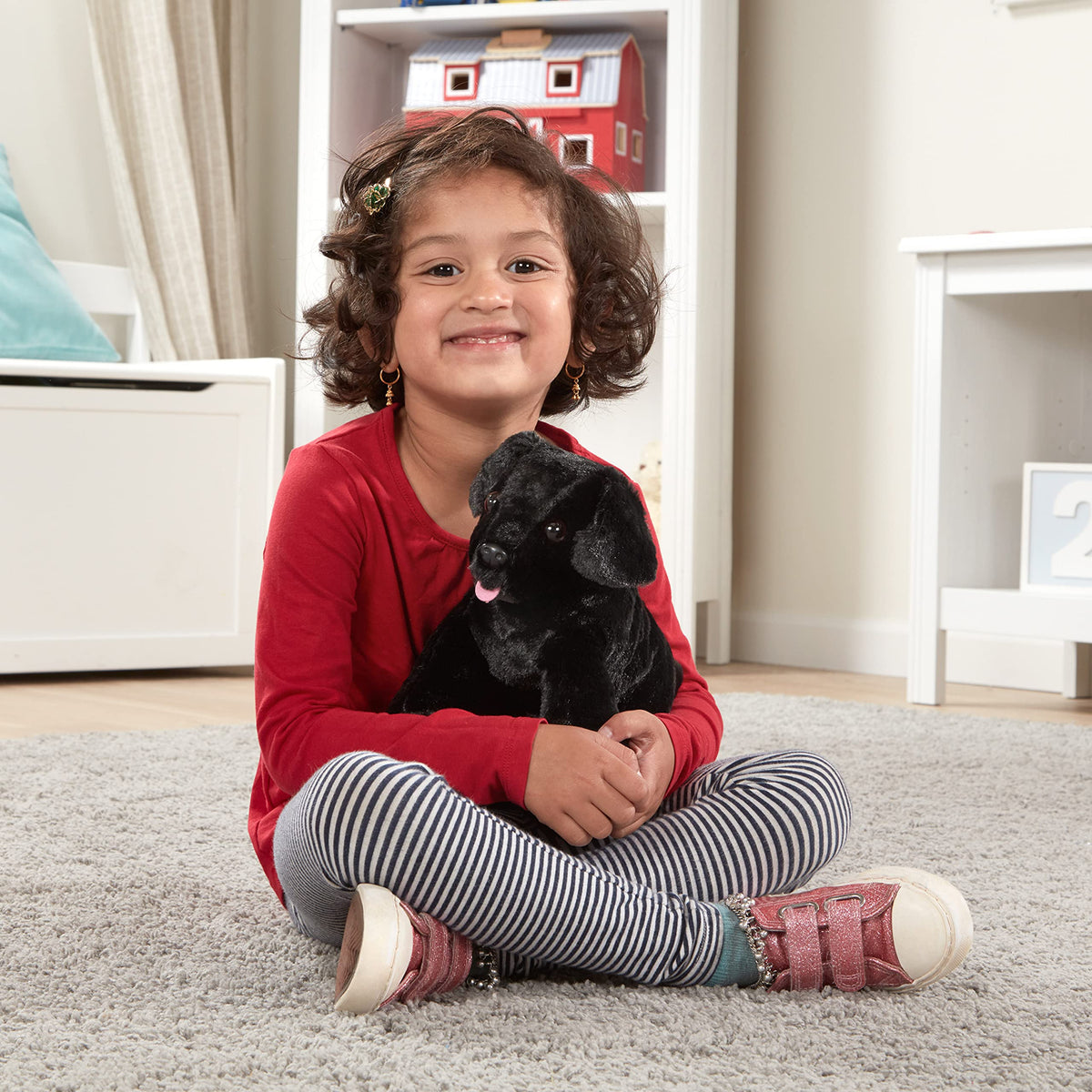 Melissa & Doug Benson Black Lab eyes and nose shine for imaginative play.
