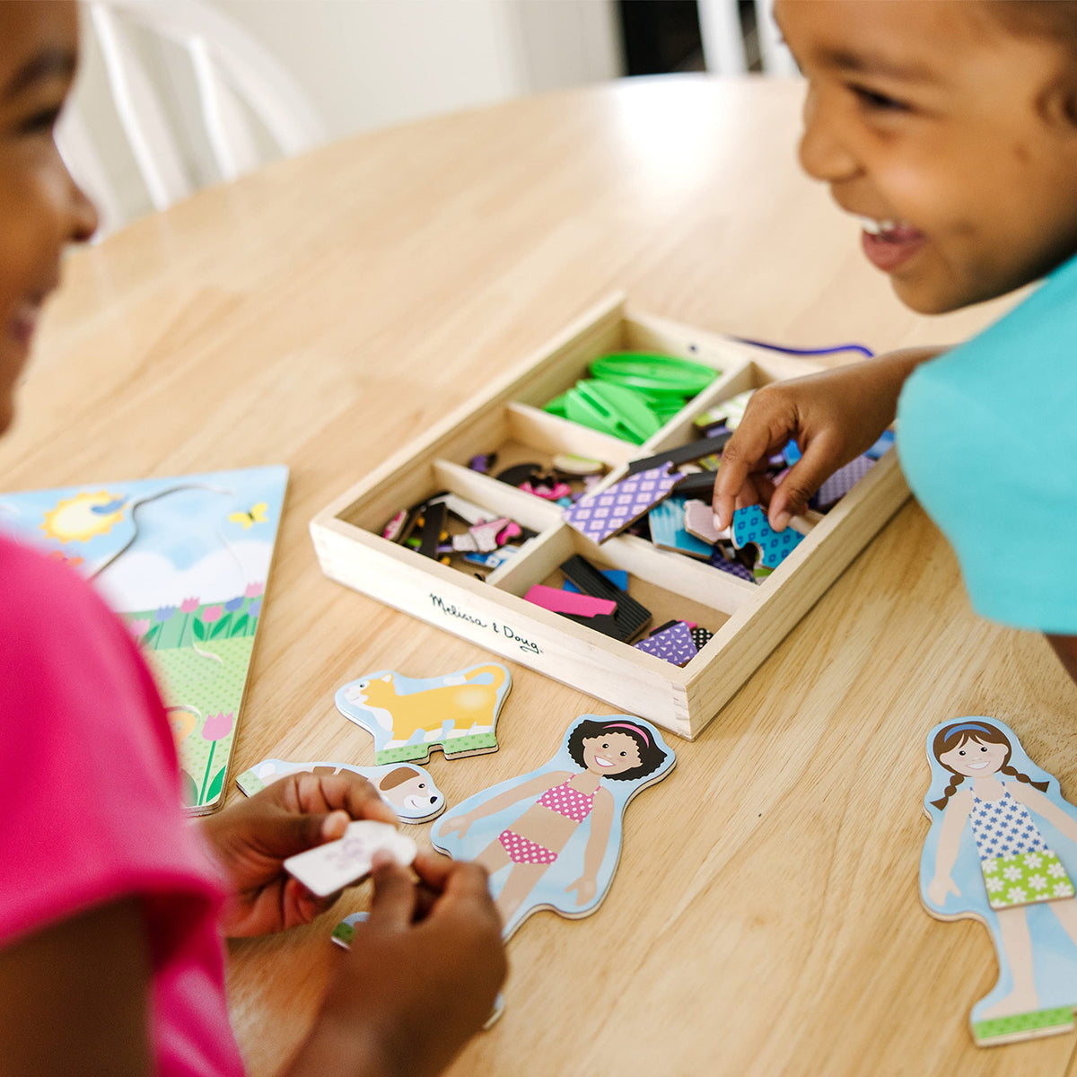 Melissa & Doug Best Friends colorful magnetic pieces enabling creative dress-up.