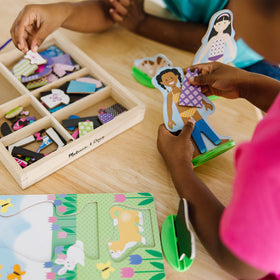 Melissa & Doug Best Friends double-sided dolls for quick outfit changes.