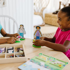 Melissa & Doug Best Friends puppy and kitten pets accompany the dolls for stories.