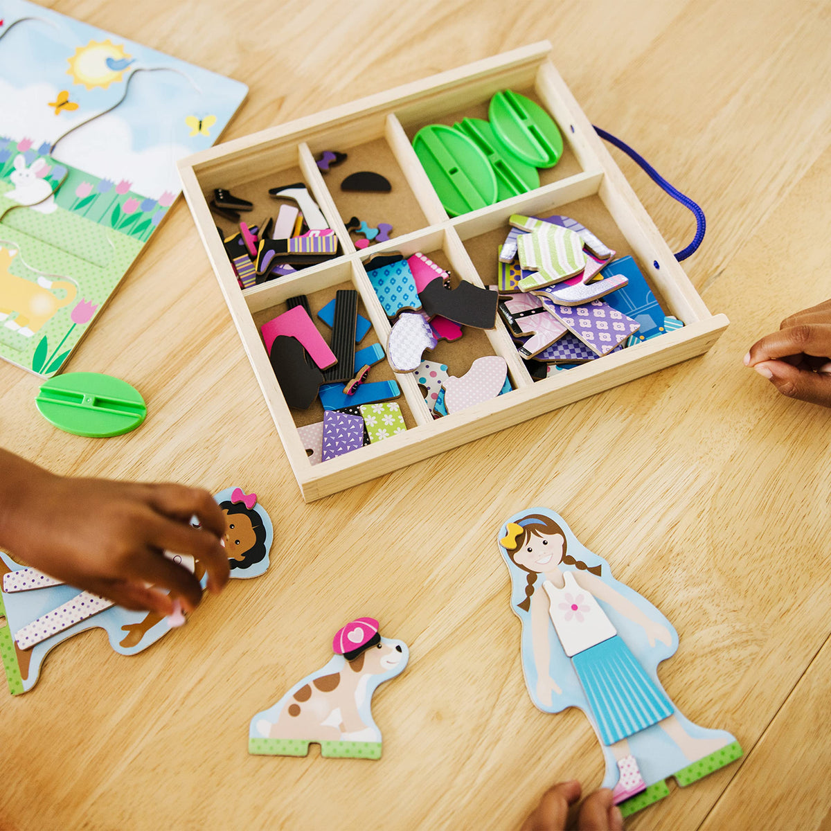 Melissa & Doug Best Friends wooden stands hold the figures steady during play.