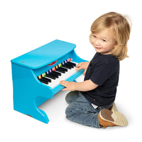 Melissa & Doug blue piano color-coded songbook guides kids through tunes.