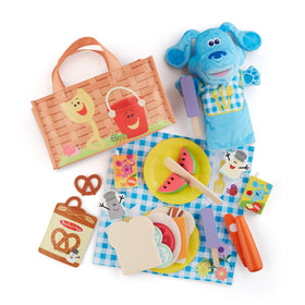 Melissa & Doug Blues Clues picnic set with Blue puppet fosters cooperative pretend play.