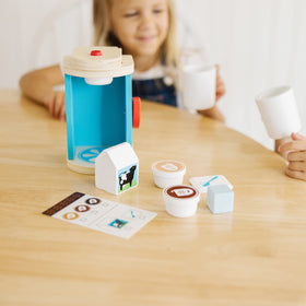 Melissa & Doug creamer and sugar add a realistic coffee ritual.