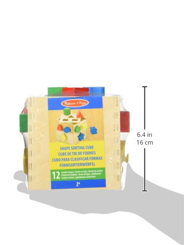 Bright shapes in the Melissa & Doug cube capture kids' attention for color learning.