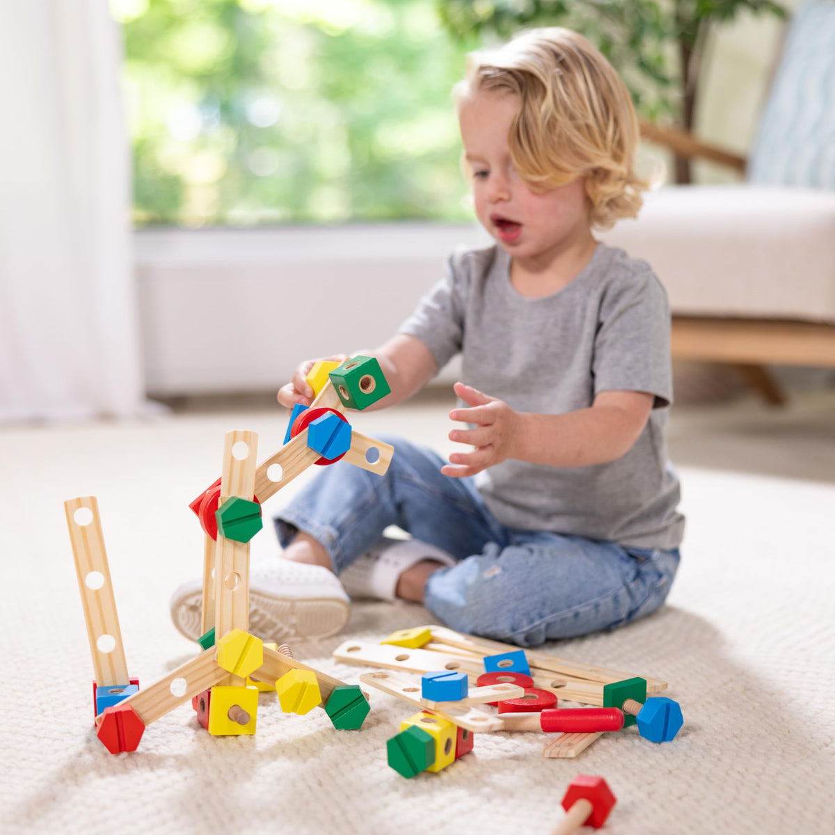 Melissa & Doug crane building guide on the box helps kids plan projects