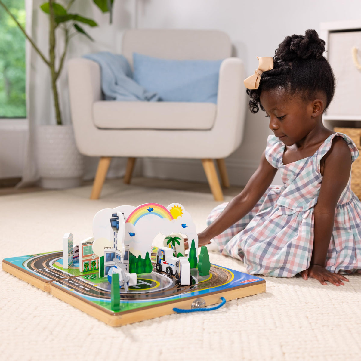 Melissa and Doug built-in tracks create smooth journey for wooden vehicles during imaginative airport play