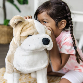 Melissa &amp; Doug bulldog sitting posture supports upright display during imaginative play.