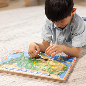 Melissa & Doug capital name audio accompanies correct piece placement.