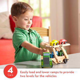 Melissa and Doug car carrier ramp extended for easy loading and unloading of cars.
