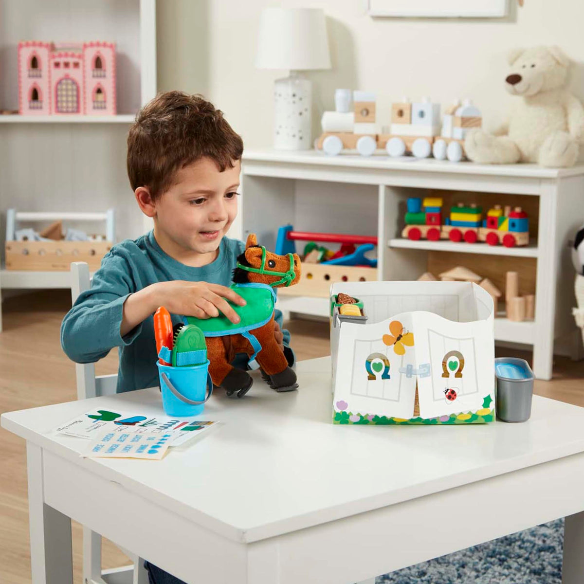 Melissa & Doug care tools such as brush and comb for grooming play.