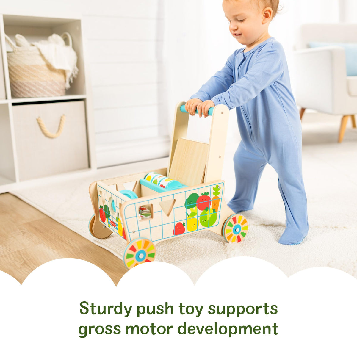 Melissa & Doug durable cart with handle supports early walking and pushing motion.