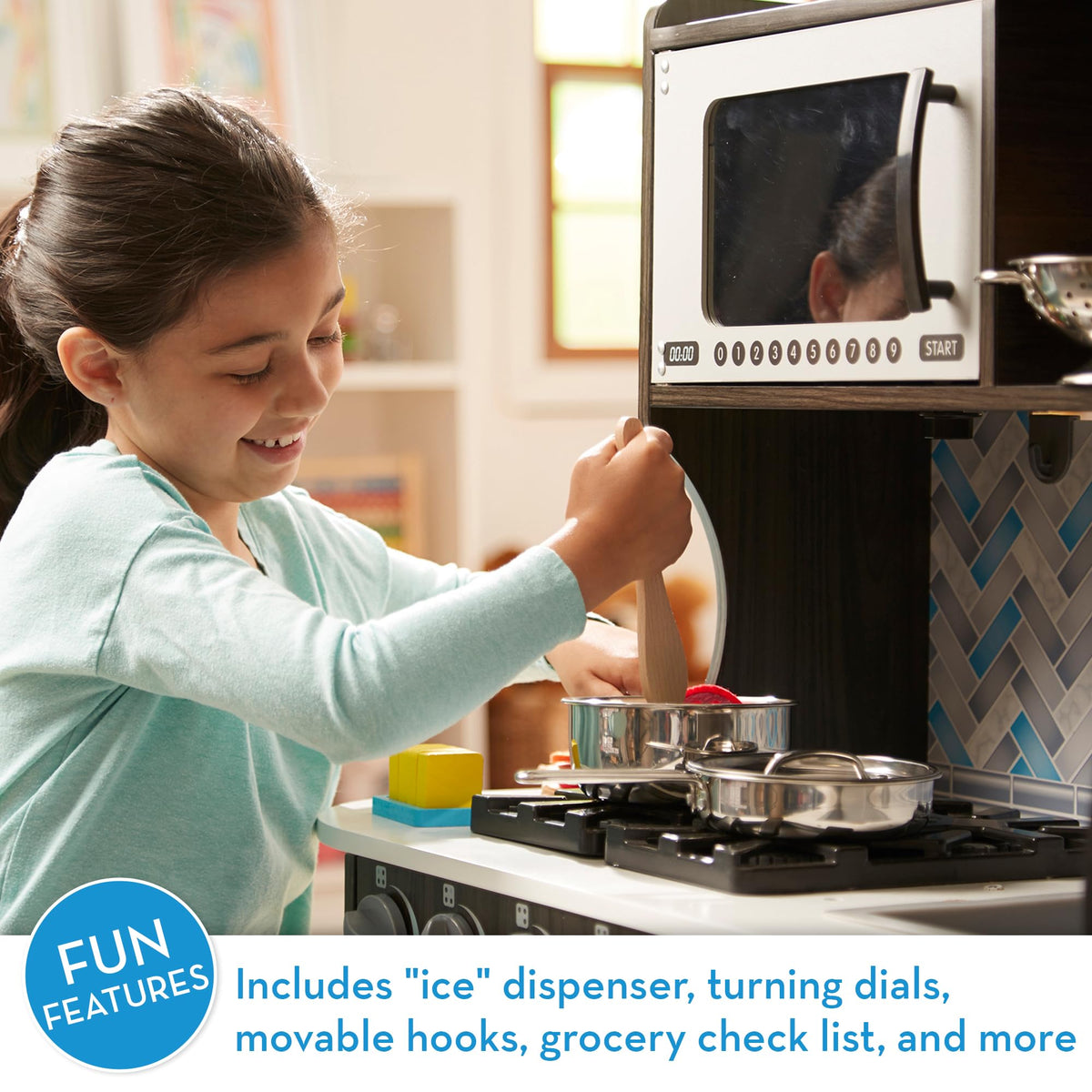 Melissa & Doug microwave with turning plate supports realistic kitchen role play.
