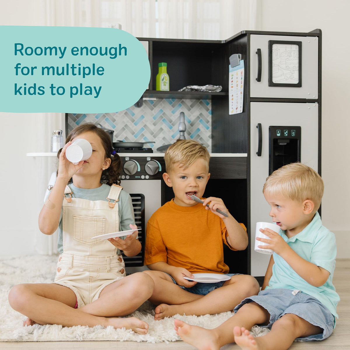 Melissa & Doug refrigerator ice dispenser enhances organized toy kitchen scenes.