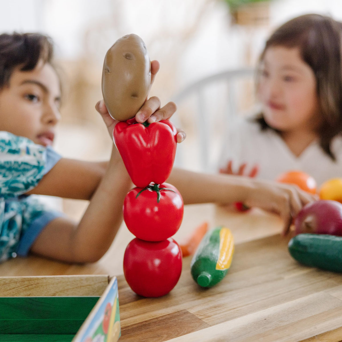 Melissa & Doug vegetable set supports sorting, counting, and pretend meals.