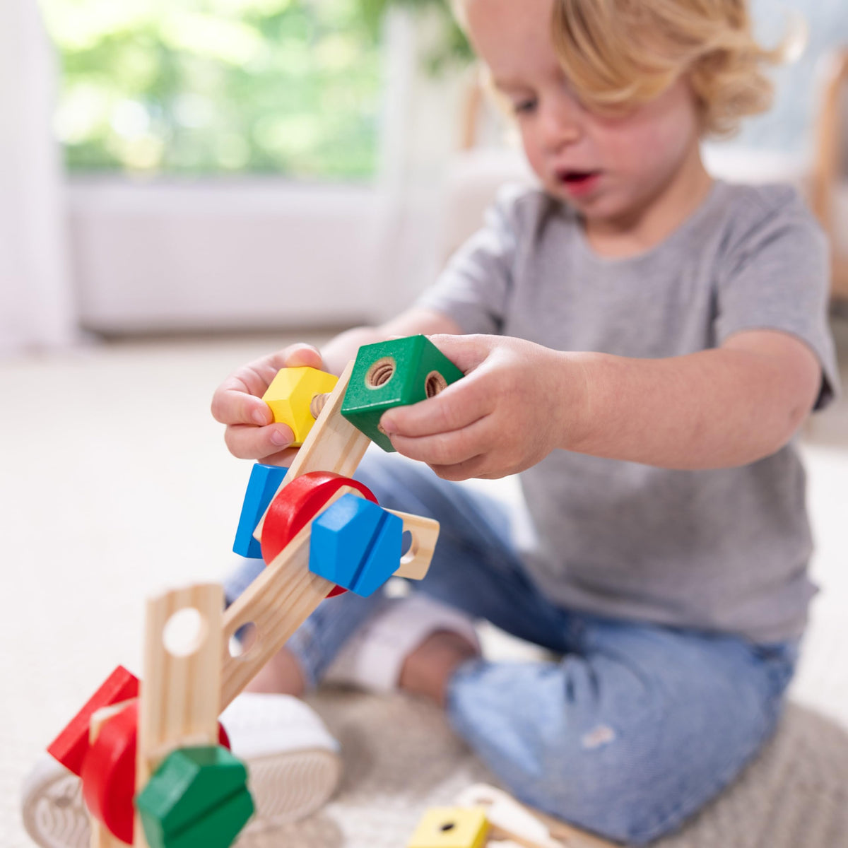 Melissa & Doug child-size screwdriver included for safe tinkering