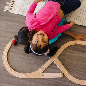 Melissa & Doug Figure Eight Train connects with other wooden rail systems for expansion.