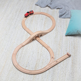 Gift-ready Melissa & Doug Figure Eight Train set packaged for easy gifting.