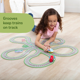 Melissa & Doug clip-on scenery pieces attach to layouts for rich pretend play