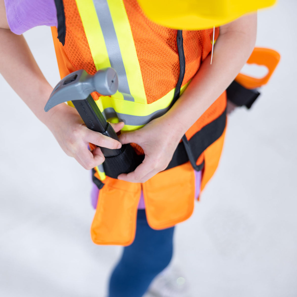 Melissa & Doug Construction Costume set laid out for classroom dress-up.