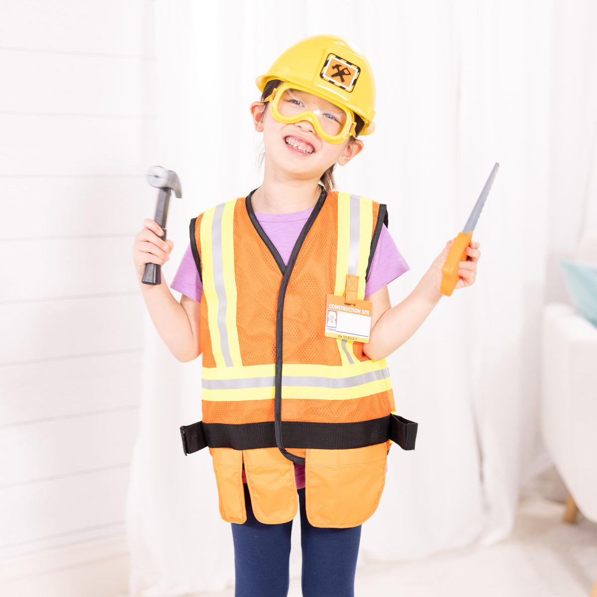 Melissa & Doug hard hat on a child for bold building adventures.