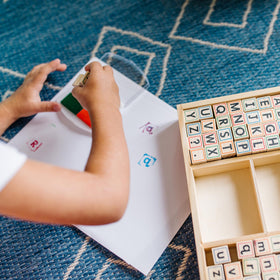 Contoured-handles on stamps enable comfortable stamping for little hands