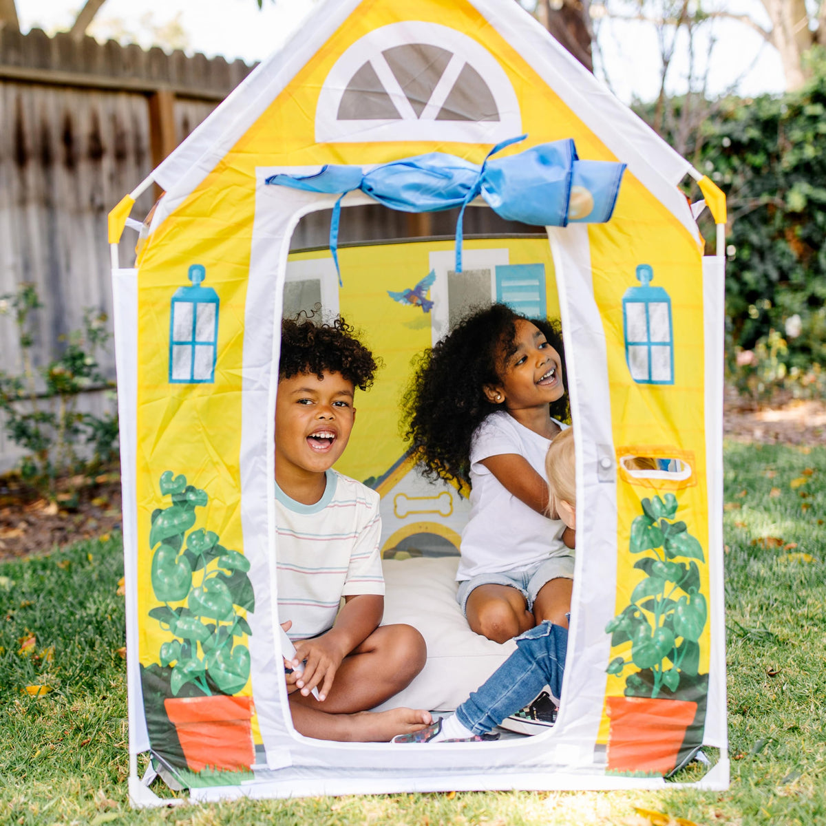Melissa & Doug Cozy Cottage tire swing detail adds whimsy