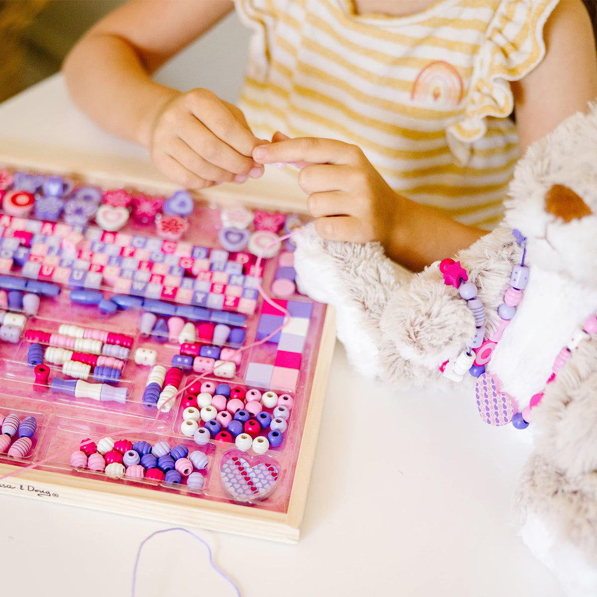 Melissa & Doug Created by Me Sparkle & Shimmer beads offer hands-on screen-free play.