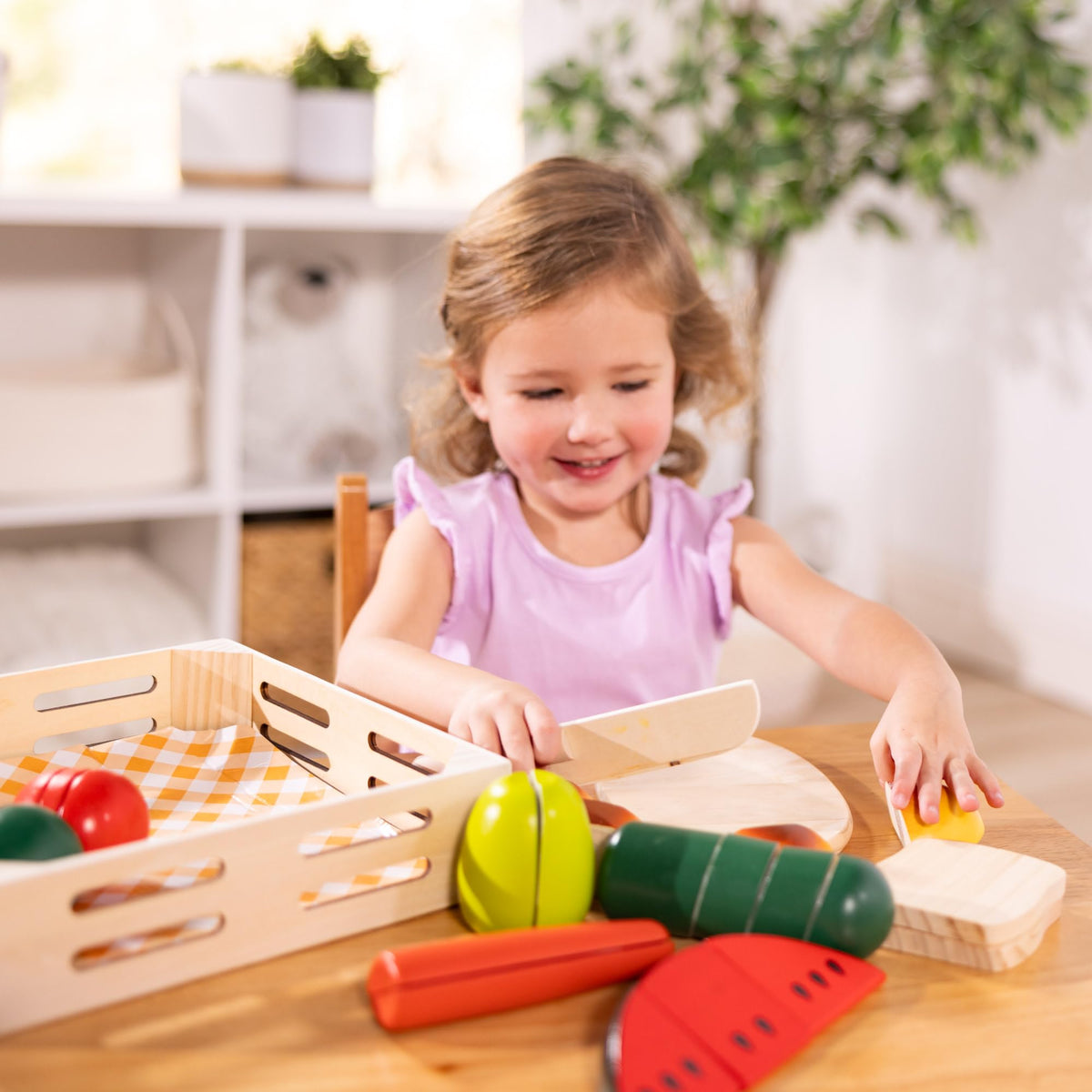 Melissa & Doug Cutting Food bright-fruits-vegetables for imaginative play with colorful, tactile pieces.