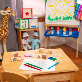 Complete 38-piece Melissa and Doug set encourages storytelling and creative expression.