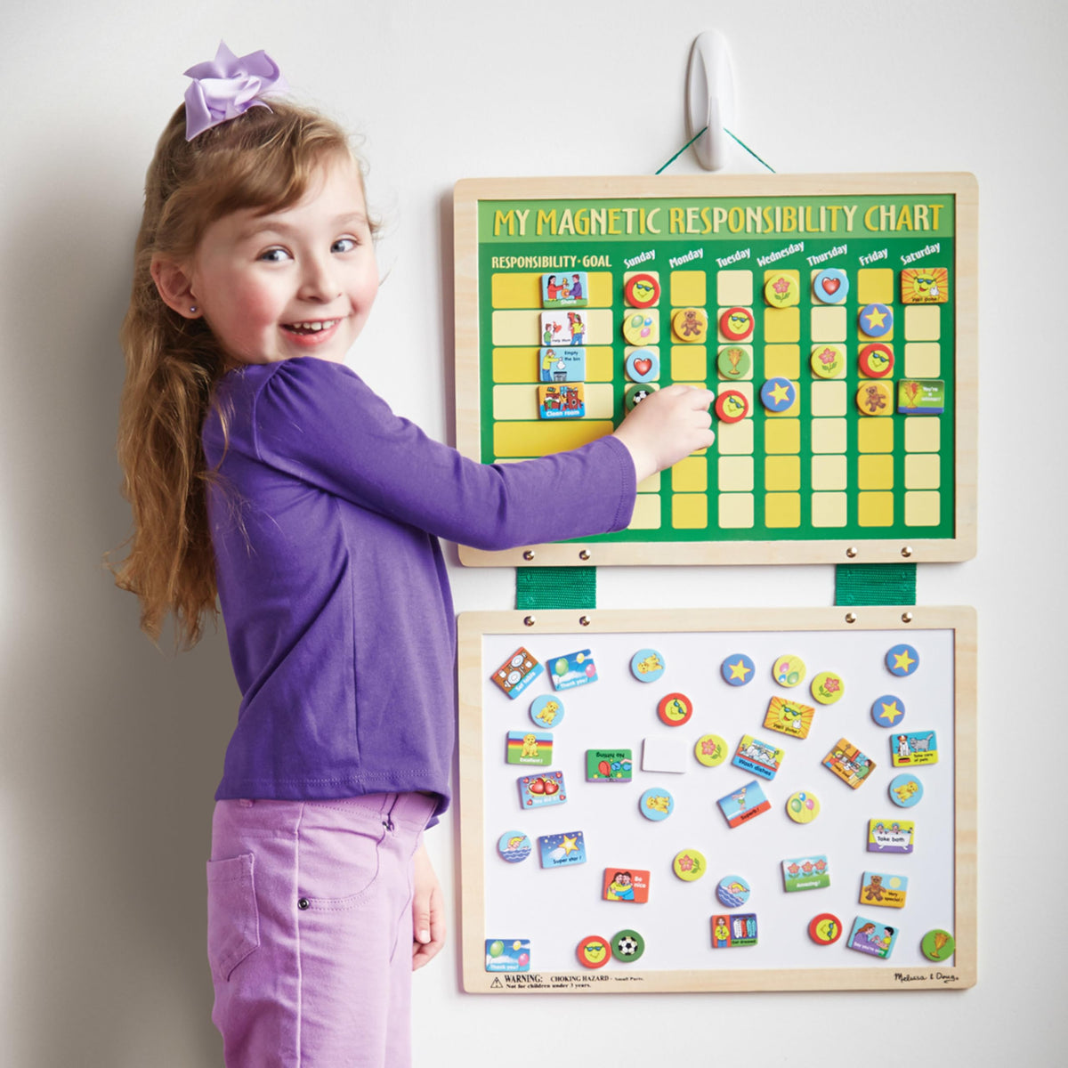 Melissa & Doug deluxe dry-erase board showing seven-goal sections for weekly goals.